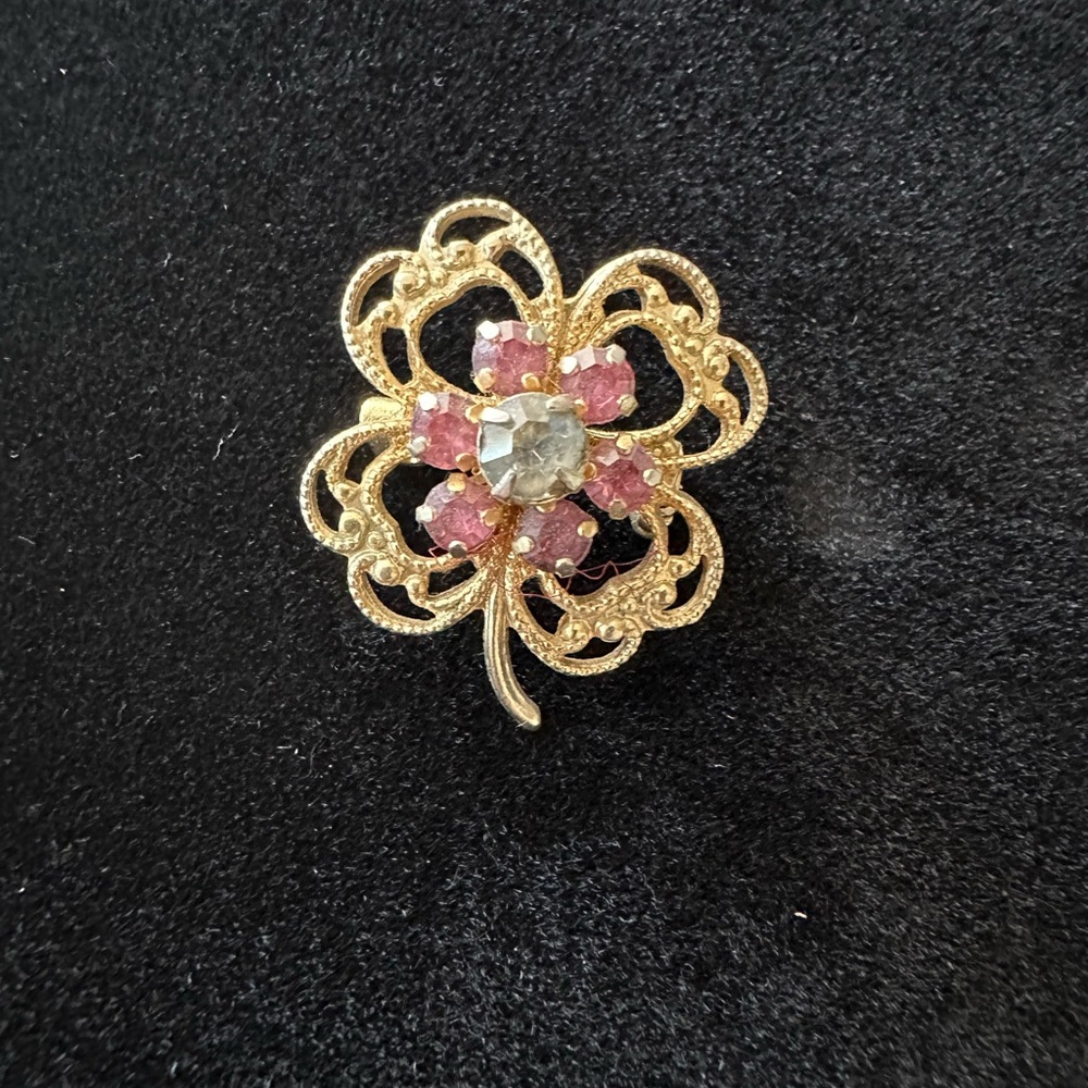 Ornate Gold and Pink Brooch with Floral Gemstone Design